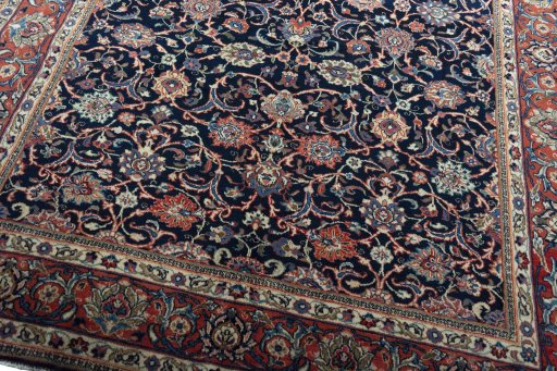 Close-up detail of 1970s Sarough rug from Iran / Persia showing Wool weave