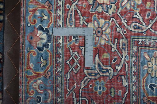 Backside of handmade New Sarough rug showing knot structure and weave density