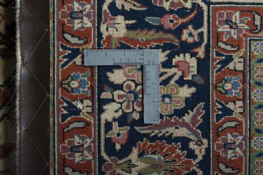 Backside of handmade New Sarough rug showing knot structure and weave density