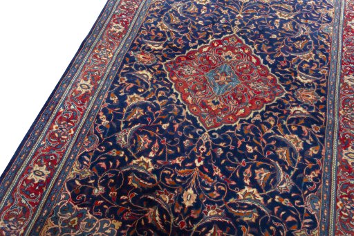 Backside of handmade New Sarough rug showing knot structure and weave density