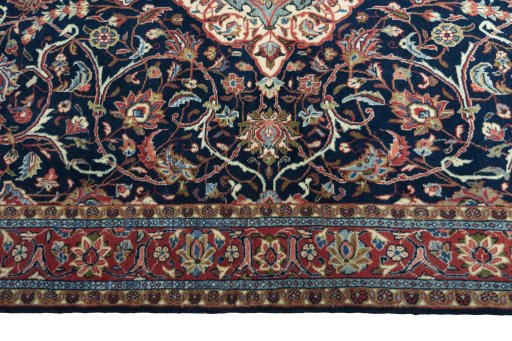 Corner detail of 2000s Sarough rug showing border pattern and Wool pile