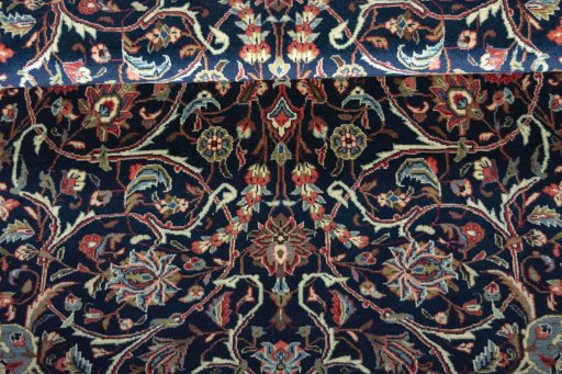 Close-up detail of 2000s Sarough rug from Iran / Persia showing Wool weave