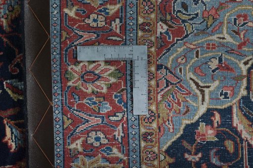 Backside of handmade 2000s Sarough rug showing knot structure and weave density
