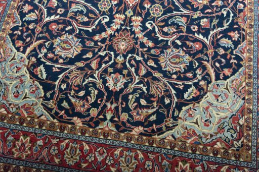 Close-up detail of 2000s Sarough rug from Iran / Persia showing Wool weave