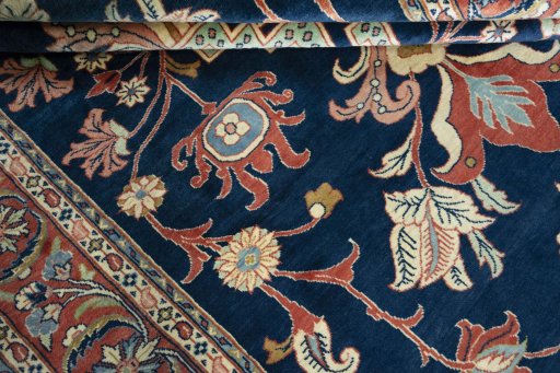 Close-up detail of New Sarough rug from Iran / Persia showing Wool weave