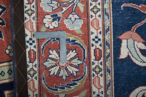 Backside of handmade New Sarough rug showing knot structure and weave density