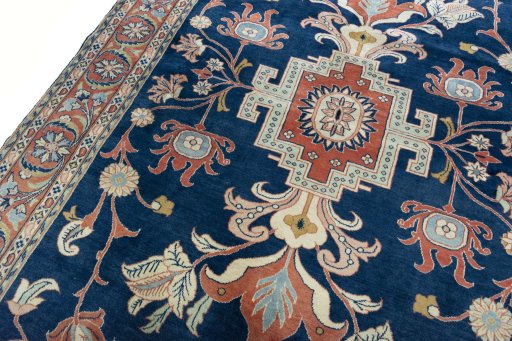 Backside of handmade New Sarough rug showing knot structure and weave density