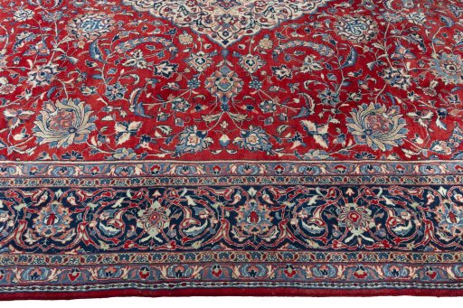 Corner detail of 2000s Sarough rug showing border pattern and Wool pile