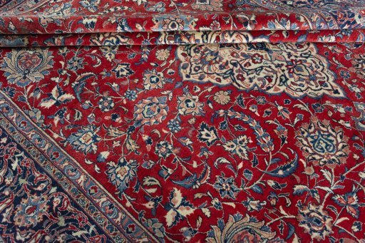 Close-up detail of 2000s Sarough rug from Iran / Persia showing Wool weave