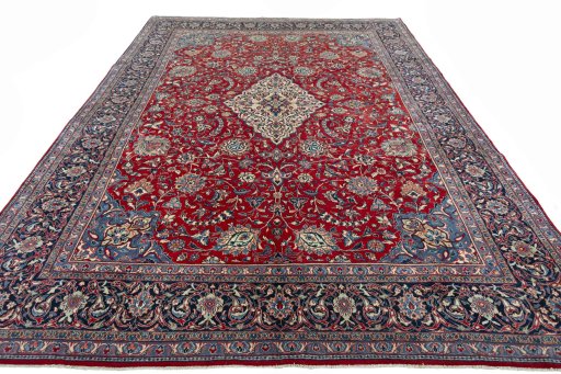 Surface texture of 2000s Sarough rug with natural Wool and intricate pattern