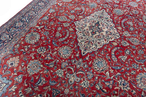 Backside of handmade 2000s Sarough rug showing knot structure and weave density