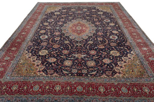 Surface texture of 2000s Sarough rug with natural Wool and intricate pattern
