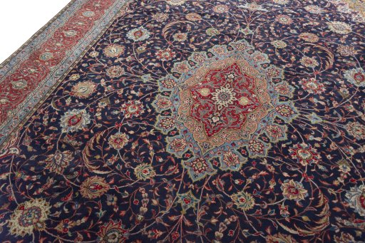 Backside of handmade 2000s Sarough rug showing knot structure and weave density