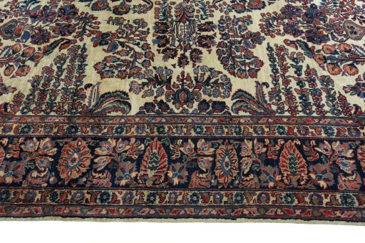 Corner detail of 1930s Sarough rug showing border pattern and Wool pile