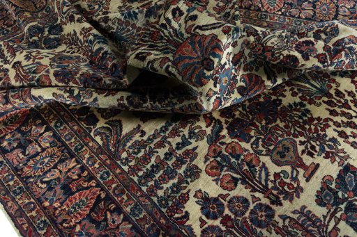 Surface texture of 1930s Sarough rug with natural Wool and intricate pattern