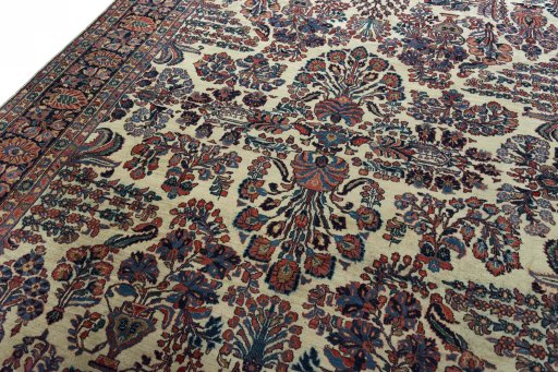 Backside of handmade 1930s Sarough rug showing knot structure and weave density