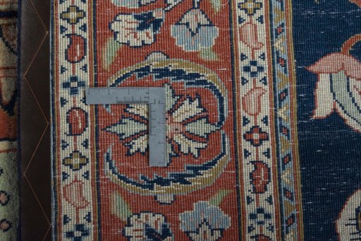 Backside of handmade New Sarough rug showing knot structure and weave density
