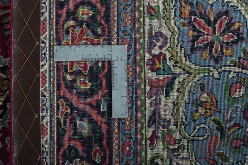 Backside of handmade 1970s Sarough rug showing knot structure and weave density