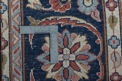 Backside of handmade New Sarough rug showing knot structure and weave density