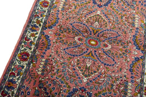 Backside of handmade 2000s Sarough rug showing knot structure and weave density