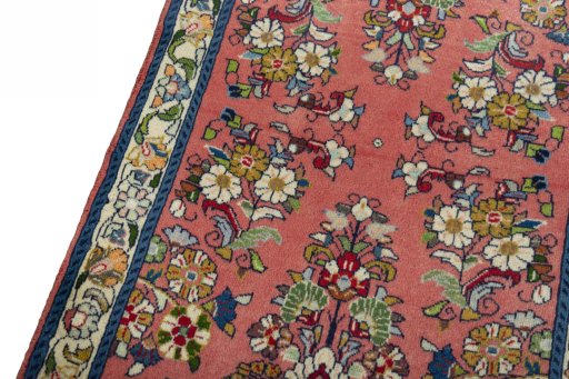 Backside of handmade New Sarough rug showing knot structure and weave density