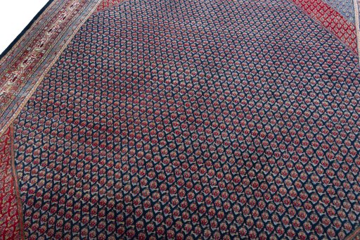 Backside of handmade 1970s Sarough rug showing knot structure and weave density