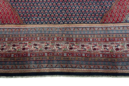 Close-up detail of 1970s Sarough rug from Iran / Persia showing Wool weave
