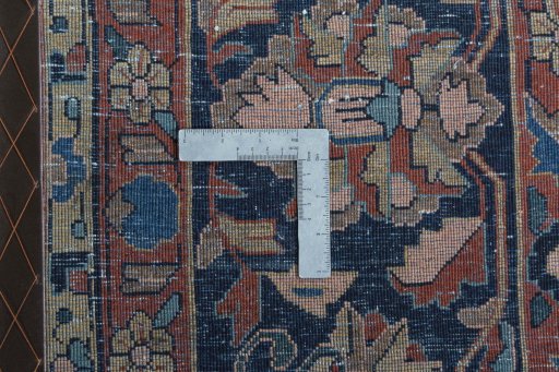Backside of handmade 1930s Sarough rug showing knot structure and weave density