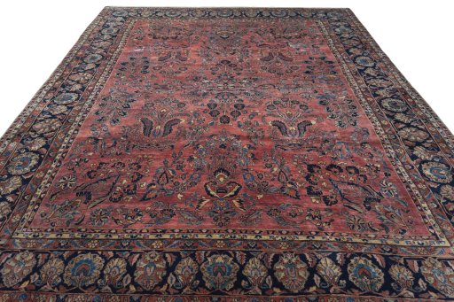 Surface texture of 1930s Sarough rug with natural Cork and intricate pattern