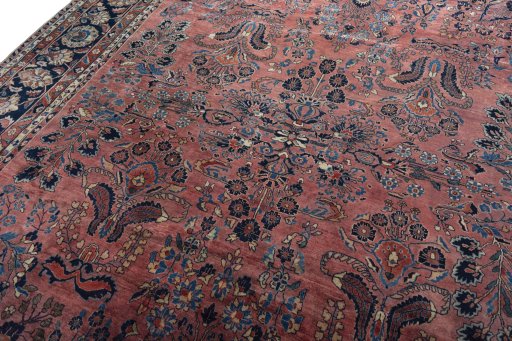 Backside of handmade 1930s Sarough rug showing knot structure and weave density