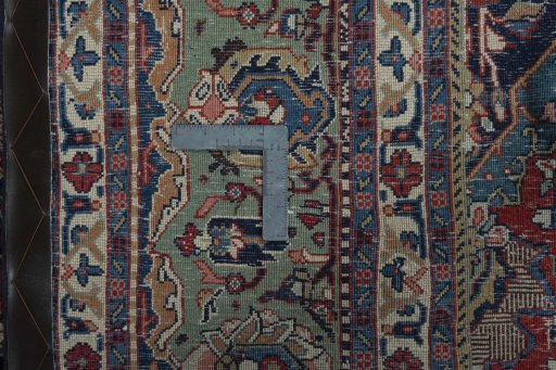 Backside of handmade 2000s Sarough rug showing knot structure and weave density