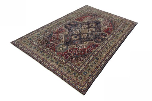 Corner detail of 2000s Sarough rug showing border pattern and Wool pile