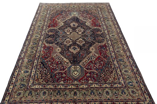 Surface texture of 2000s Sarough rug with natural Wool and intricate pattern