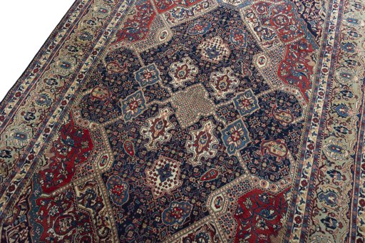 Backside of handmade 2000s Sarough rug showing knot structure and weave density