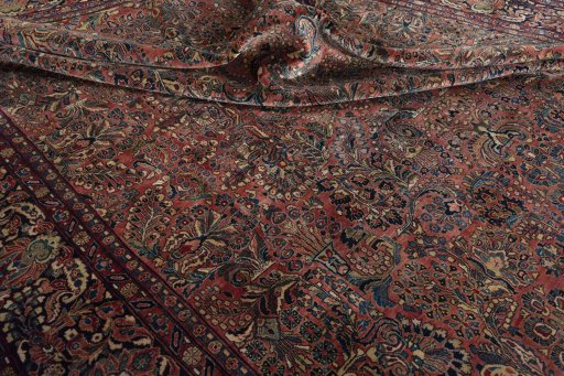 Surface texture of 1930s Sarough rug with natural Cork and intricate pattern