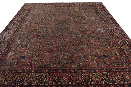 Surface texture of 1930s Sarough rug with natural Cork and intricate pattern