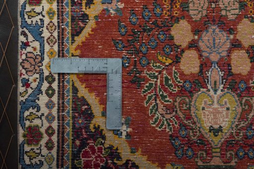 Corner detail of 2000s Sarough rug showing border pattern and Wool pile