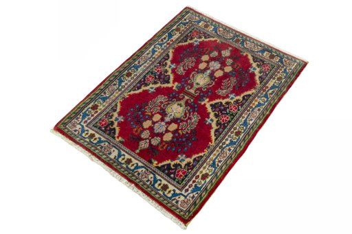 Corner detail of 2000s Sarough rug showing border pattern and Wool pile