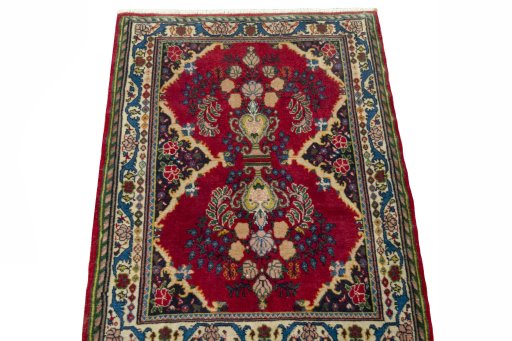 Surface texture of 2000s Sarough rug with natural Wool and intricate pattern
