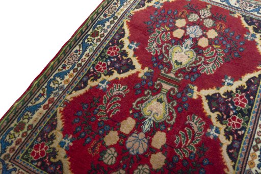 Backside of handmade 2000s Sarough rug showing knot structure and weave density