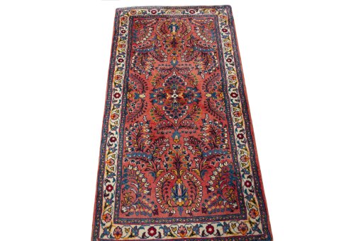 Surface texture of 2000s Sarough rug with natural Wool and intricate pattern