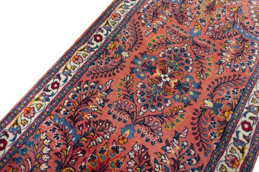 Backside of handmade 2000s Sarough rug showing knot structure and weave density