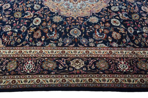Corner detail of 2000s Sarough rug showing border pattern and Wool pile