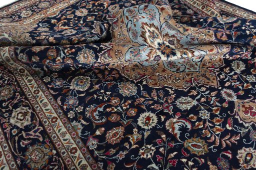 Surface texture of 2000s Sarough rug with natural Wool and intricate pattern