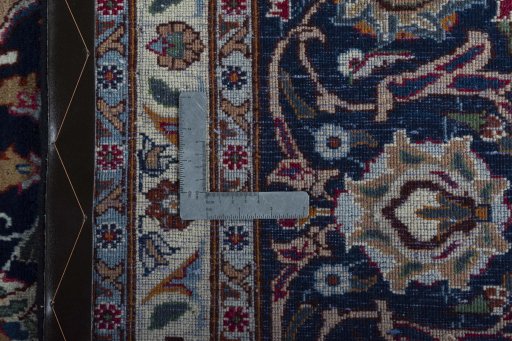 Backside of handmade 2000s Sarough rug showing knot structure and weave density