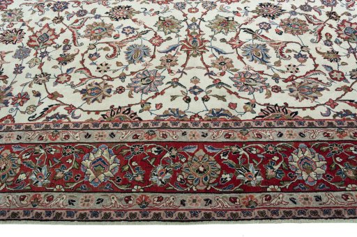 Corner detail of 2000s Sarough rug showing border pattern and Wool pile