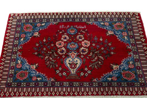 Surface texture of 2000s Sarough rug with natural Wool and intricate pattern