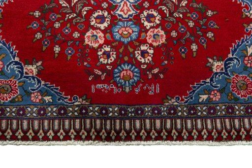 Backside of handmade 2000s Sarough rug showing knot structure and weave density