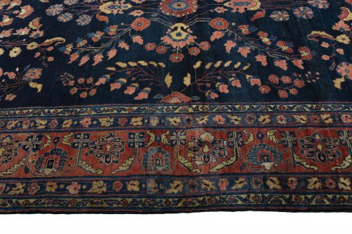 Corner detail of 1930s Sarough rug showing border pattern and Cork pile