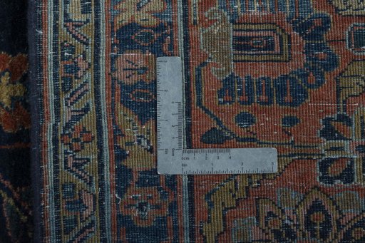 Backside of handmade 1930s Sarough rug showing knot structure and weave density